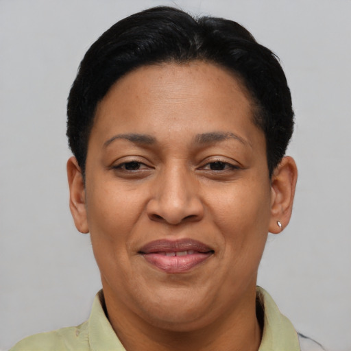 Joyful asian adult female with short  brown hair and brown eyes