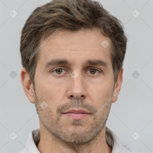 Neutral white adult male with short  brown hair and brown eyes