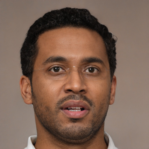 Neutral black young-adult male with short  brown hair and brown eyes