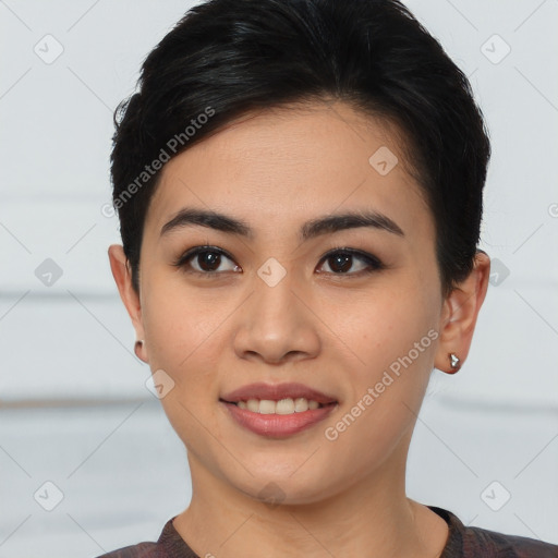 Joyful asian young-adult female with short  brown hair and brown eyes