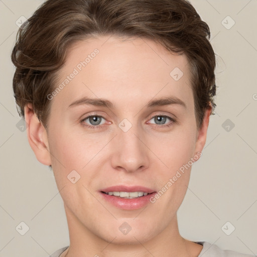 Joyful white young-adult female with short  brown hair and grey eyes