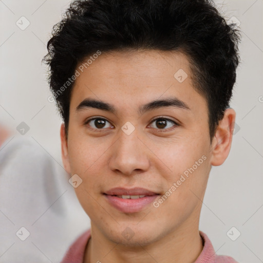 Joyful latino young-adult male with short  brown hair and brown eyes