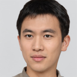 Neutral asian young-adult male with short  brown hair and brown eyes