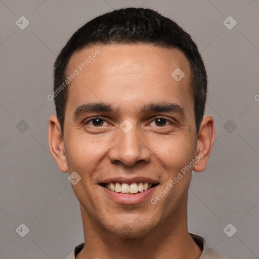 Joyful white young-adult male with short  black hair and brown eyes