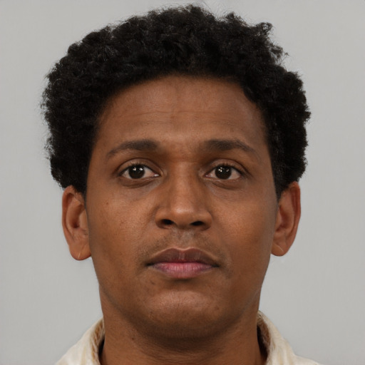 Neutral black young-adult male with short  brown hair and brown eyes