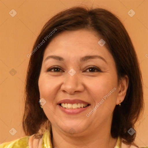 Joyful white adult female with medium  brown hair and brown eyes