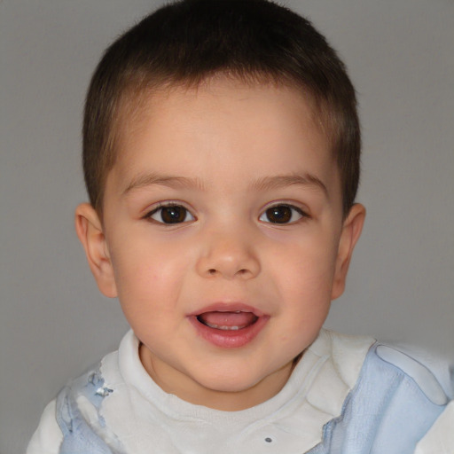 Joyful white child male with short  brown hair and brown eyes