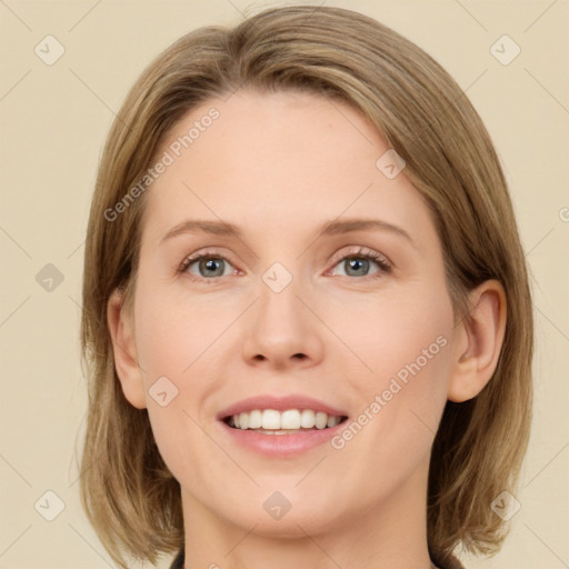 Joyful white young-adult female with medium  brown hair and green eyes