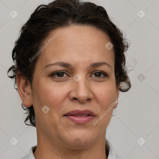 Joyful white adult female with short  brown hair and brown eyes