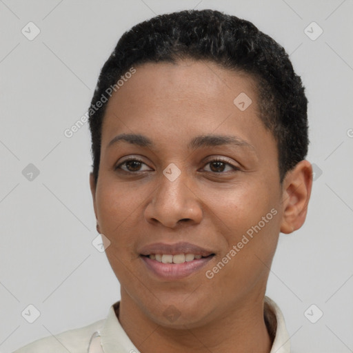 Joyful latino young-adult female with short  black hair and brown eyes