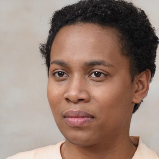 Neutral black young-adult female with short  black hair and brown eyes