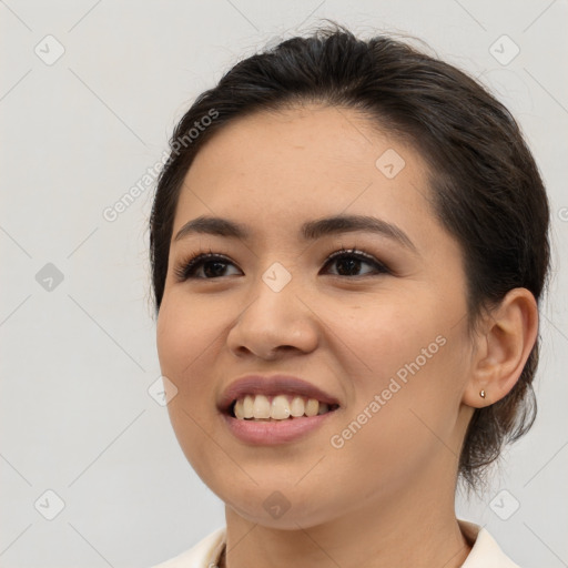 Joyful white young-adult female with medium  brown hair and brown eyes