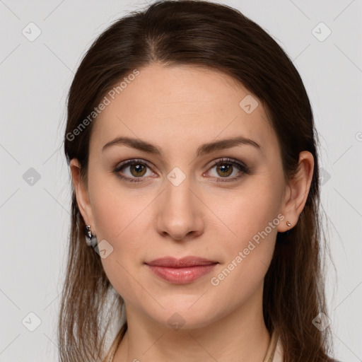 Joyful white young-adult female with long  brown hair and grey eyes