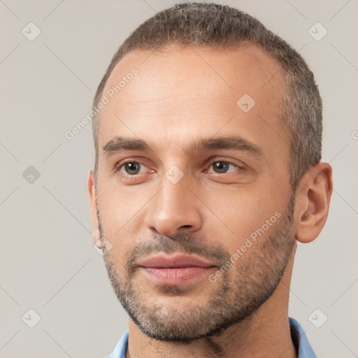 Neutral white young-adult male with short  brown hair and brown eyes