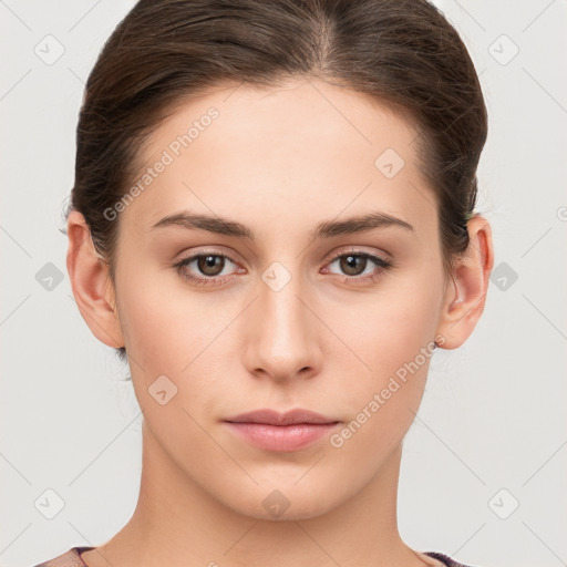 Neutral white young-adult female with short  brown hair and brown eyes