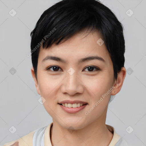 Joyful asian young-adult female with short  black hair and brown eyes