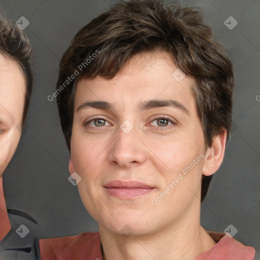 Joyful white adult female with short  brown hair and brown eyes