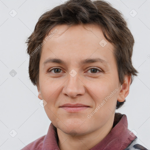 Joyful white adult female with short  brown hair and brown eyes