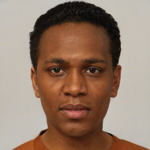 Neutral black young-adult male with short  black hair and brown eyes