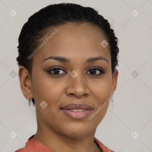 Joyful black young-adult female with short  brown hair and brown eyes