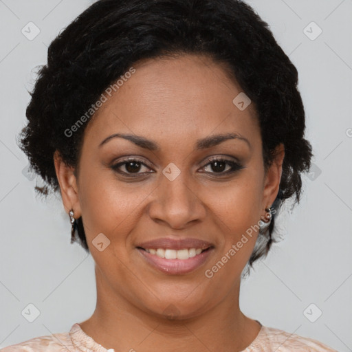 Joyful black adult female with short  brown hair and brown eyes