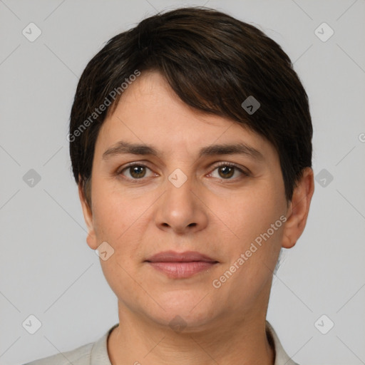 Joyful white young-adult female with short  brown hair and brown eyes