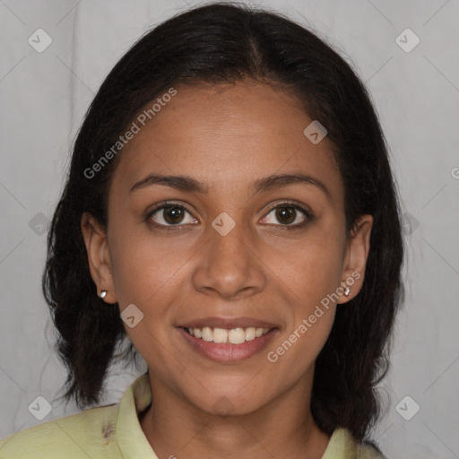 Joyful latino young-adult female with medium  brown hair and brown eyes