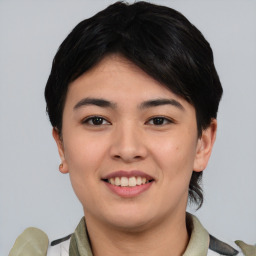 Joyful asian young-adult female with short  brown hair and brown eyes