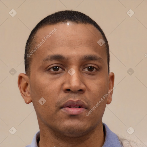 Neutral latino adult male with short  brown hair and brown eyes