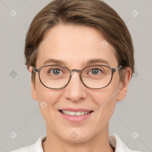 Joyful white adult female with short  brown hair and brown eyes