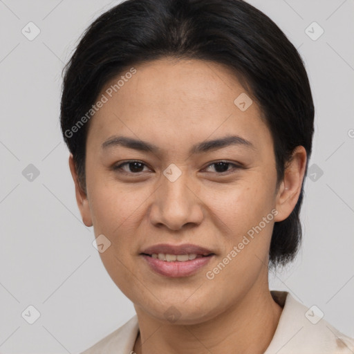 Joyful asian young-adult female with short  black hair and brown eyes