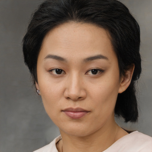 Neutral asian young-adult female with medium  black hair and brown eyes