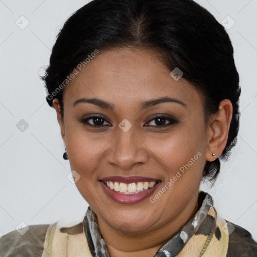 Joyful latino young-adult female with short  brown hair and brown eyes