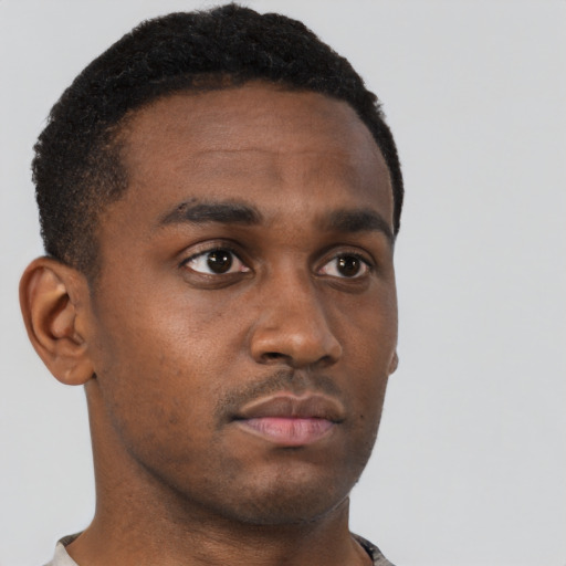 Neutral black young-adult male with short  brown hair and brown eyes