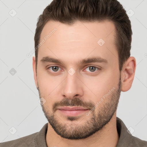 Neutral white young-adult male with short  brown hair and brown eyes