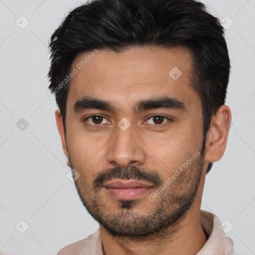 Joyful asian young-adult male with short  black hair and brown eyes