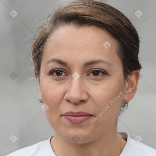 Joyful white adult female with short  brown hair and brown eyes