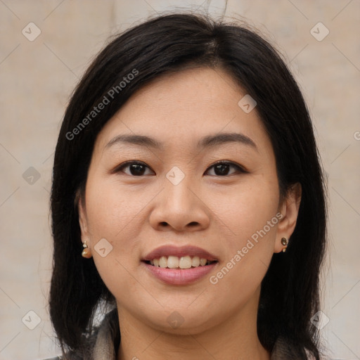 Joyful asian young-adult female with medium  brown hair and brown eyes