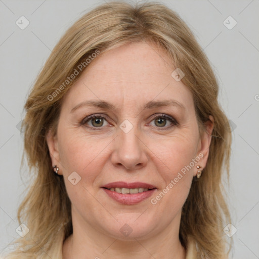 Joyful white adult female with medium  brown hair and grey eyes