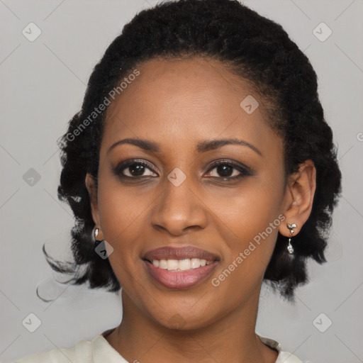 Joyful black young-adult female with medium  black hair and brown eyes