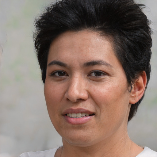 Joyful white young-adult female with short  black hair and brown eyes
