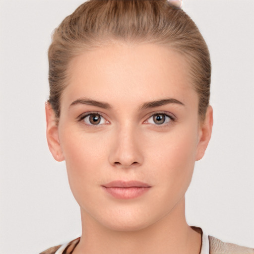 Neutral white young-adult female with short  brown hair and brown eyes