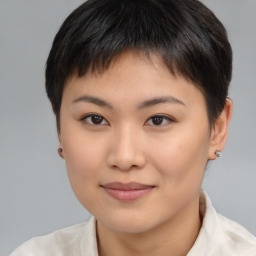 Joyful asian young-adult female with short  brown hair and brown eyes