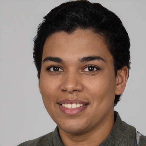 Joyful latino young-adult female with short  black hair and brown eyes