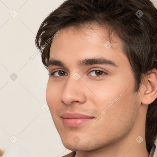 Joyful white young-adult male with medium  brown hair and brown eyes