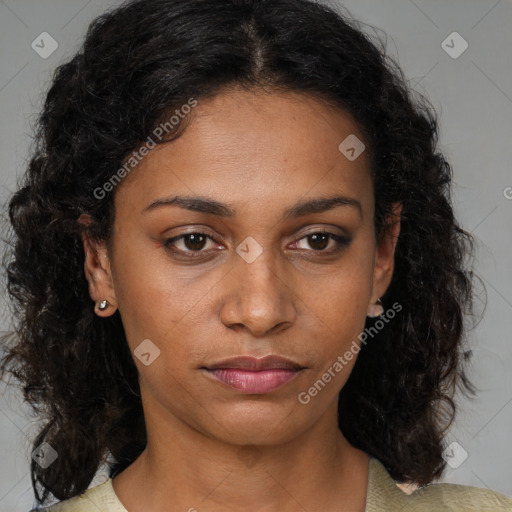 Joyful black young-adult female with medium  brown hair and brown eyes