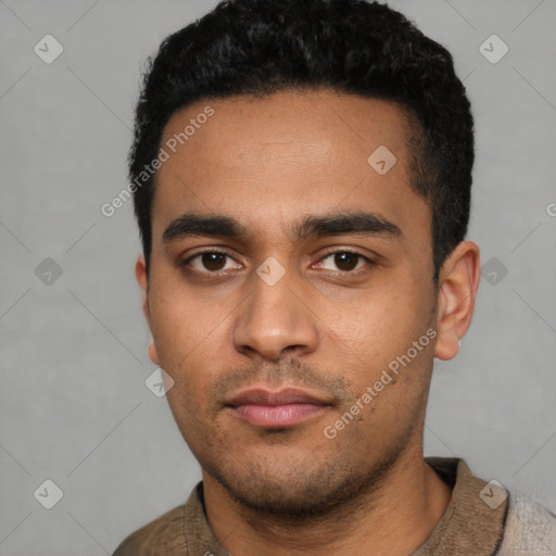 Neutral latino young-adult male with short  black hair and brown eyes