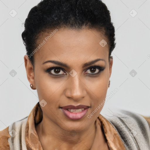 Joyful black young-adult female with short  brown hair and brown eyes