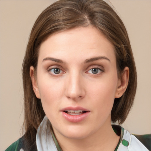 Neutral white young-adult female with medium  brown hair and green eyes