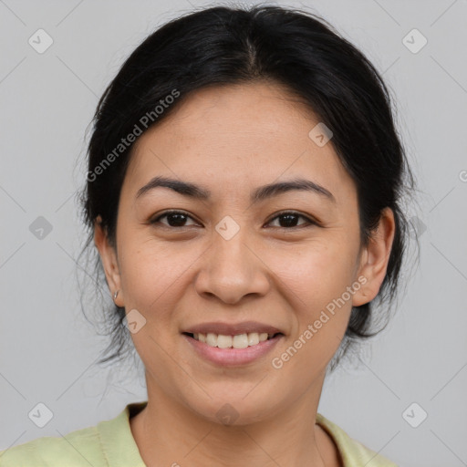 Joyful asian young-adult female with medium  brown hair and brown eyes